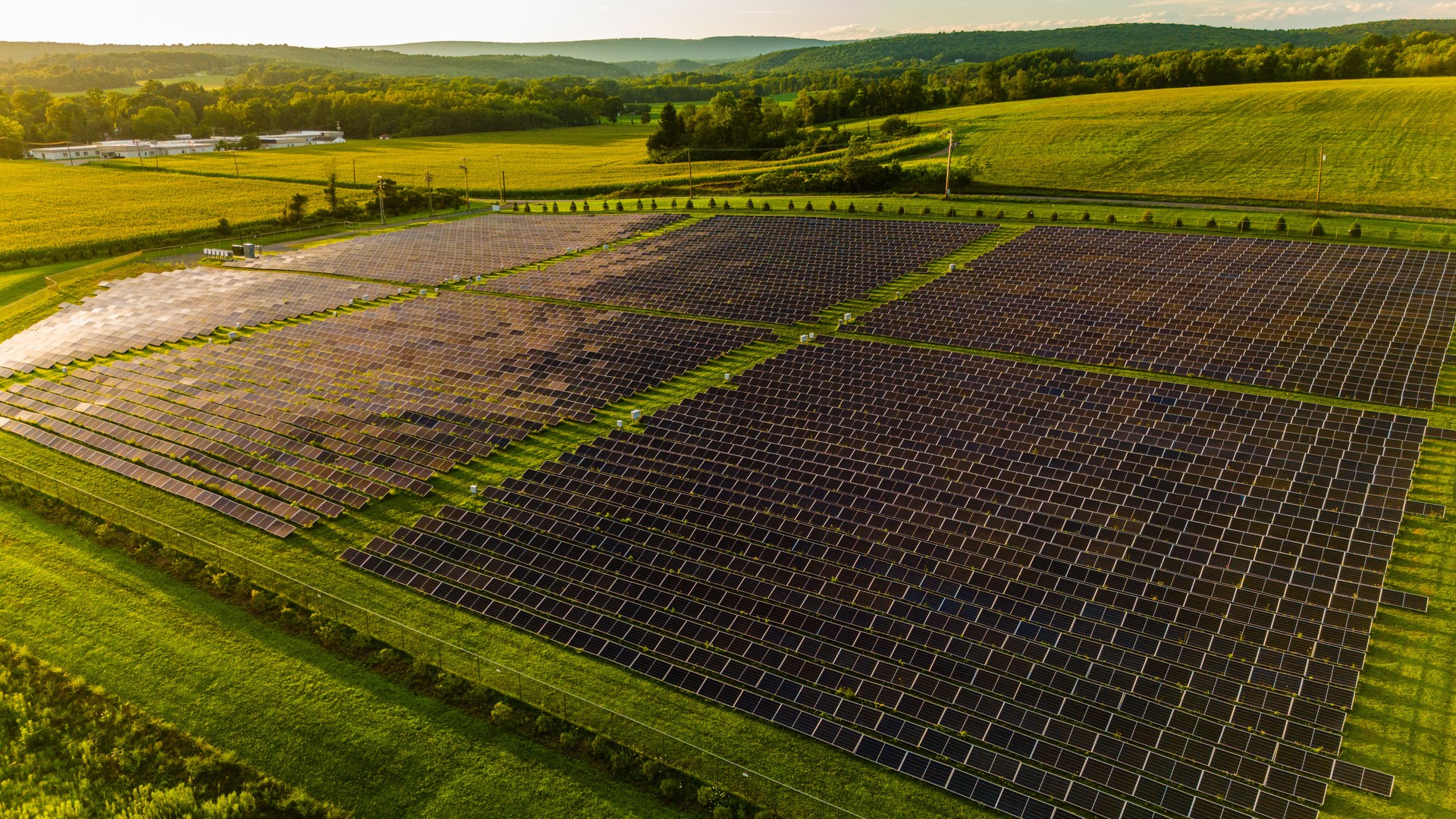 Eco friendly sun power in countryside of Poconos. Vast solar installation spreads across Brodheadsville green fields